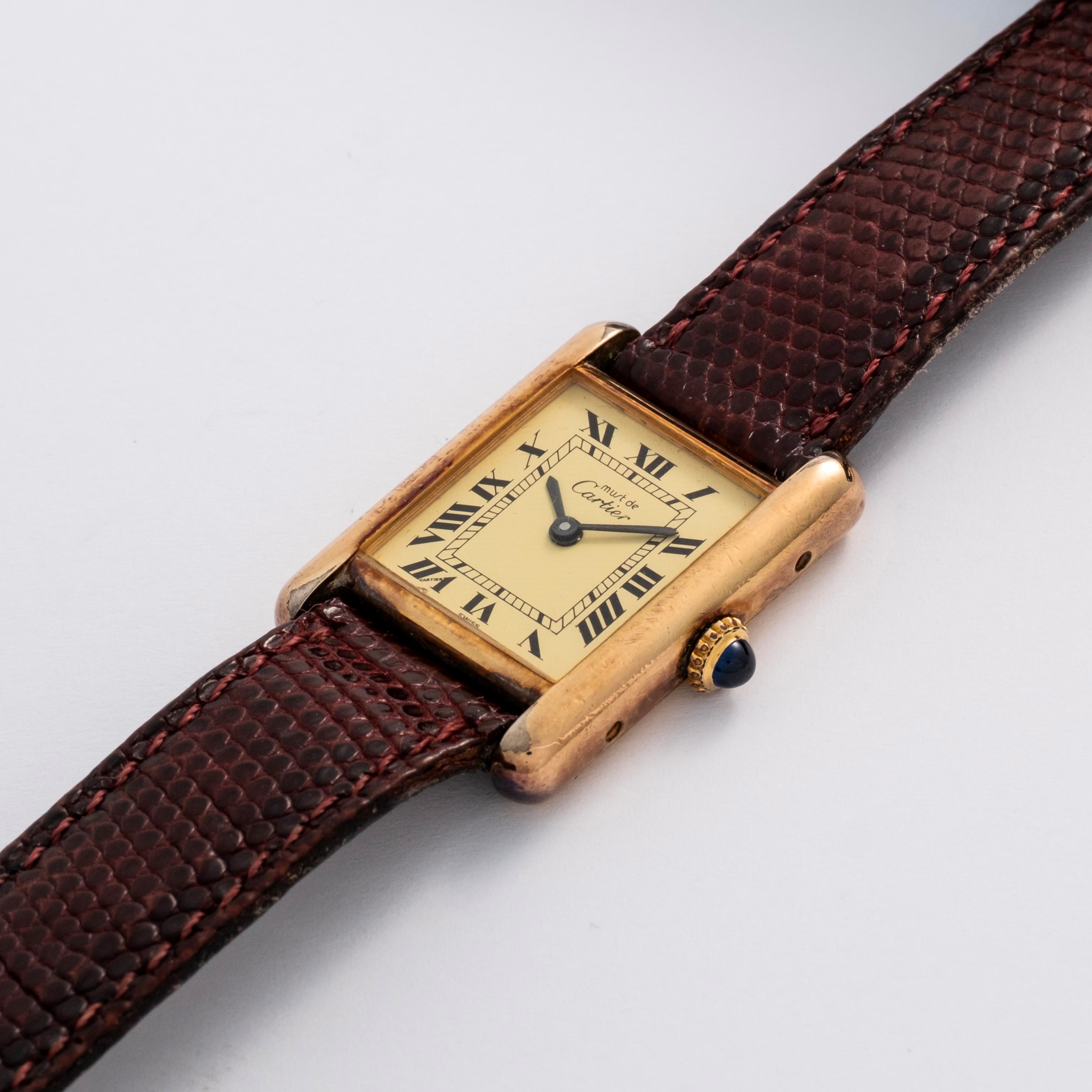 Cartier - Tank in argento laminato con quadrante champagne, circa 1980