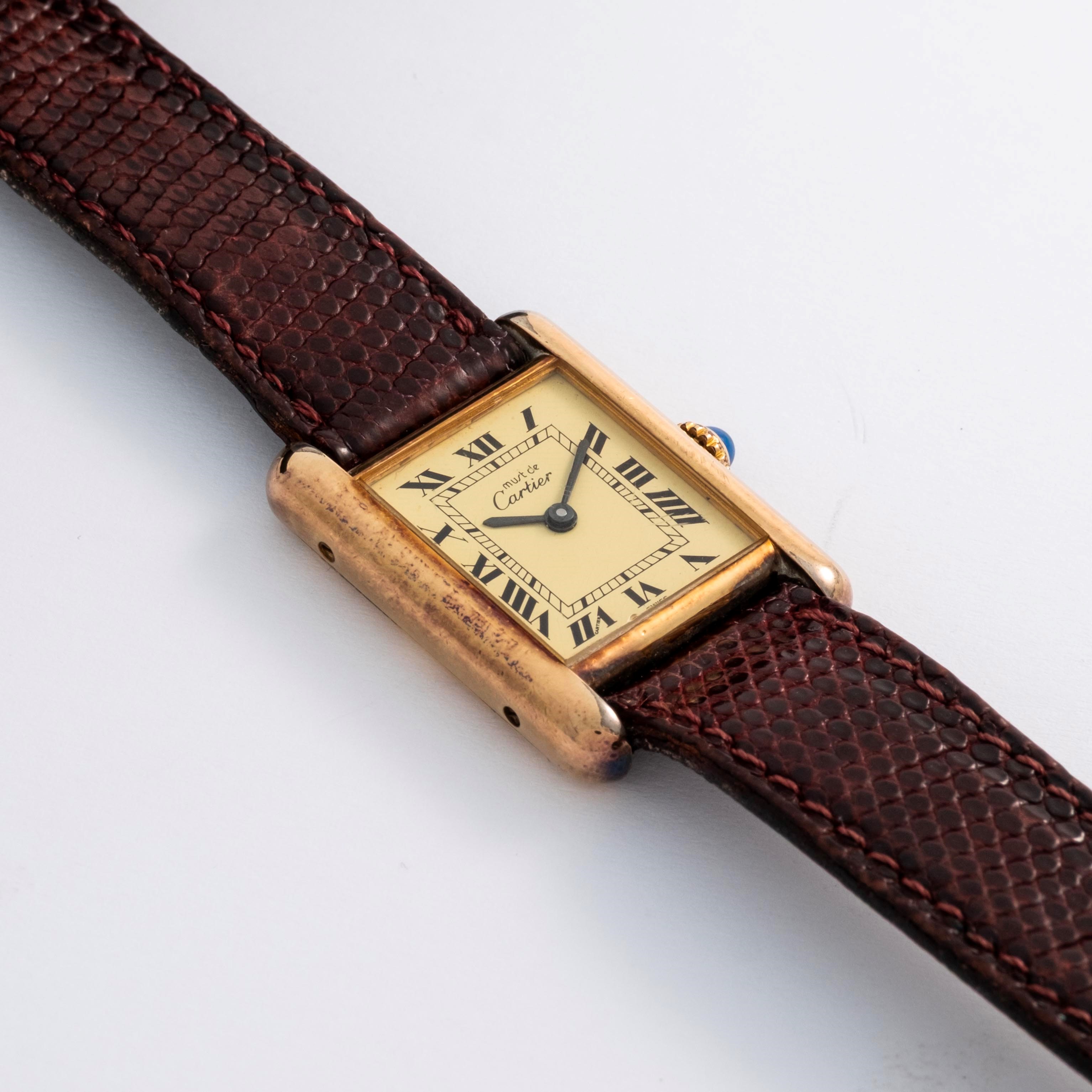 Cartier - Tank in argento laminato con quadrante champagne, circa 1980
