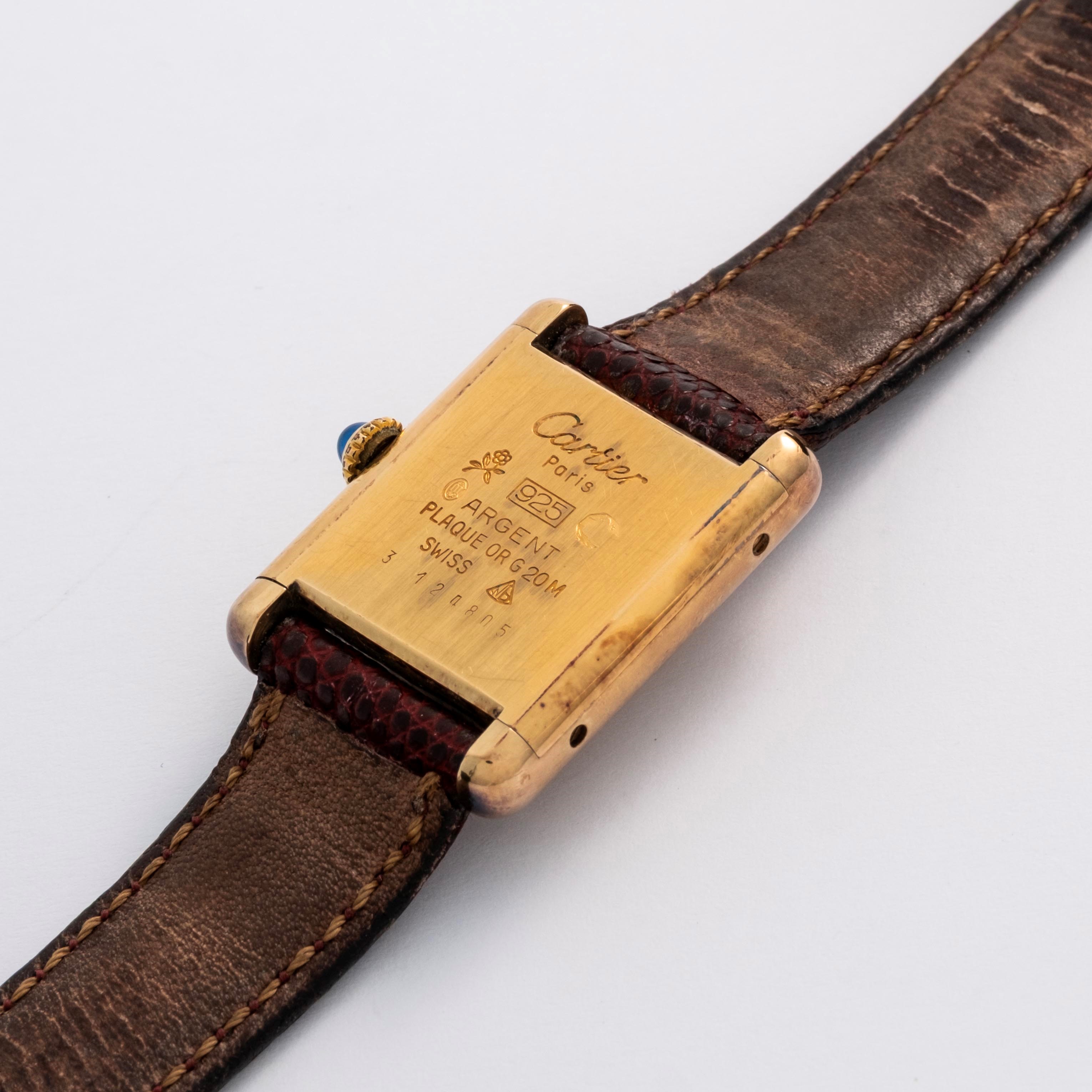 Cartier - Tank in argento laminato con quadrante champagne, circa 1980