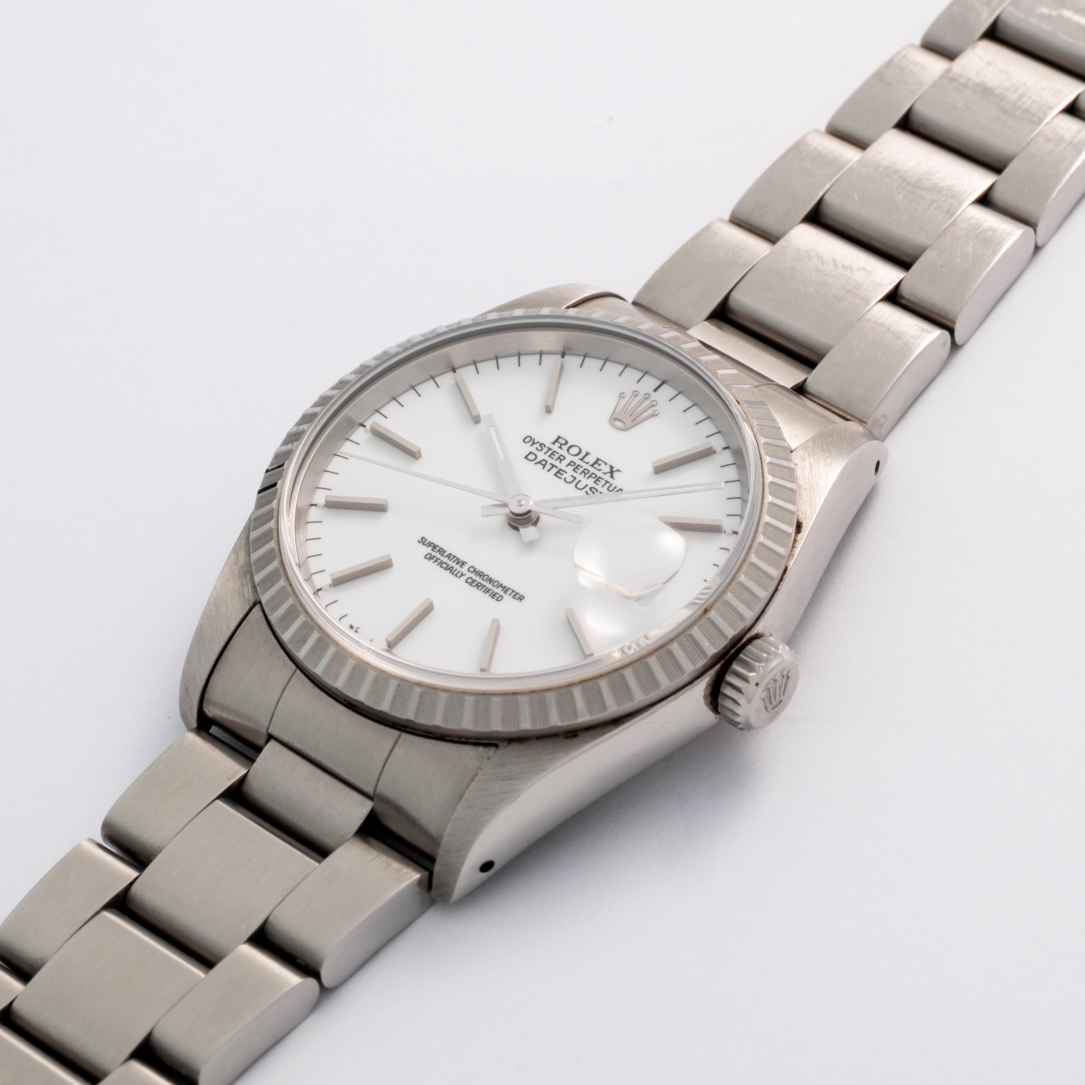 Rolex - Datejust ref. 16220 in acciaio con quadrante bianco e ghiera godronata (circa 1990)