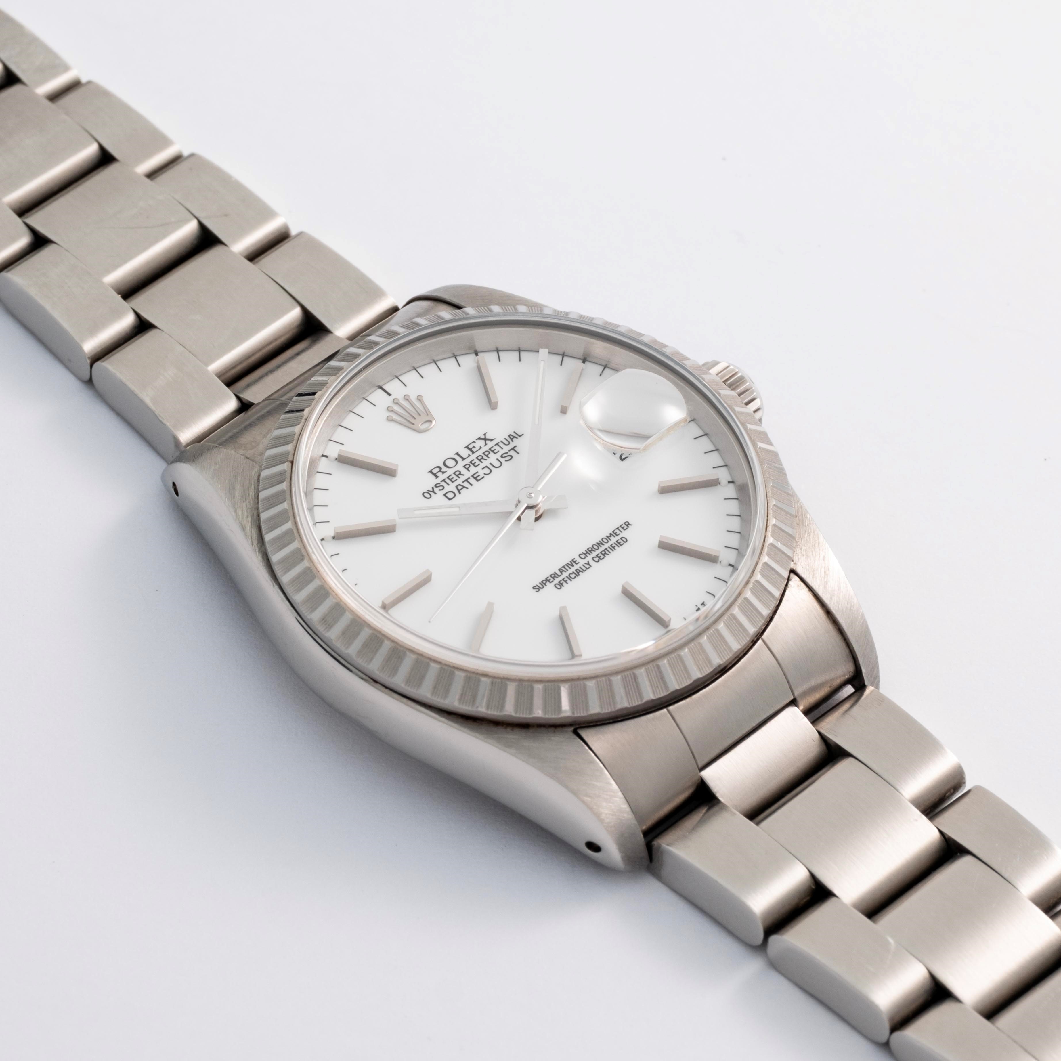 Rolex - Datejust ref. 16220 in acciaio con quadrante bianco e ghiera godronata (circa 1990)