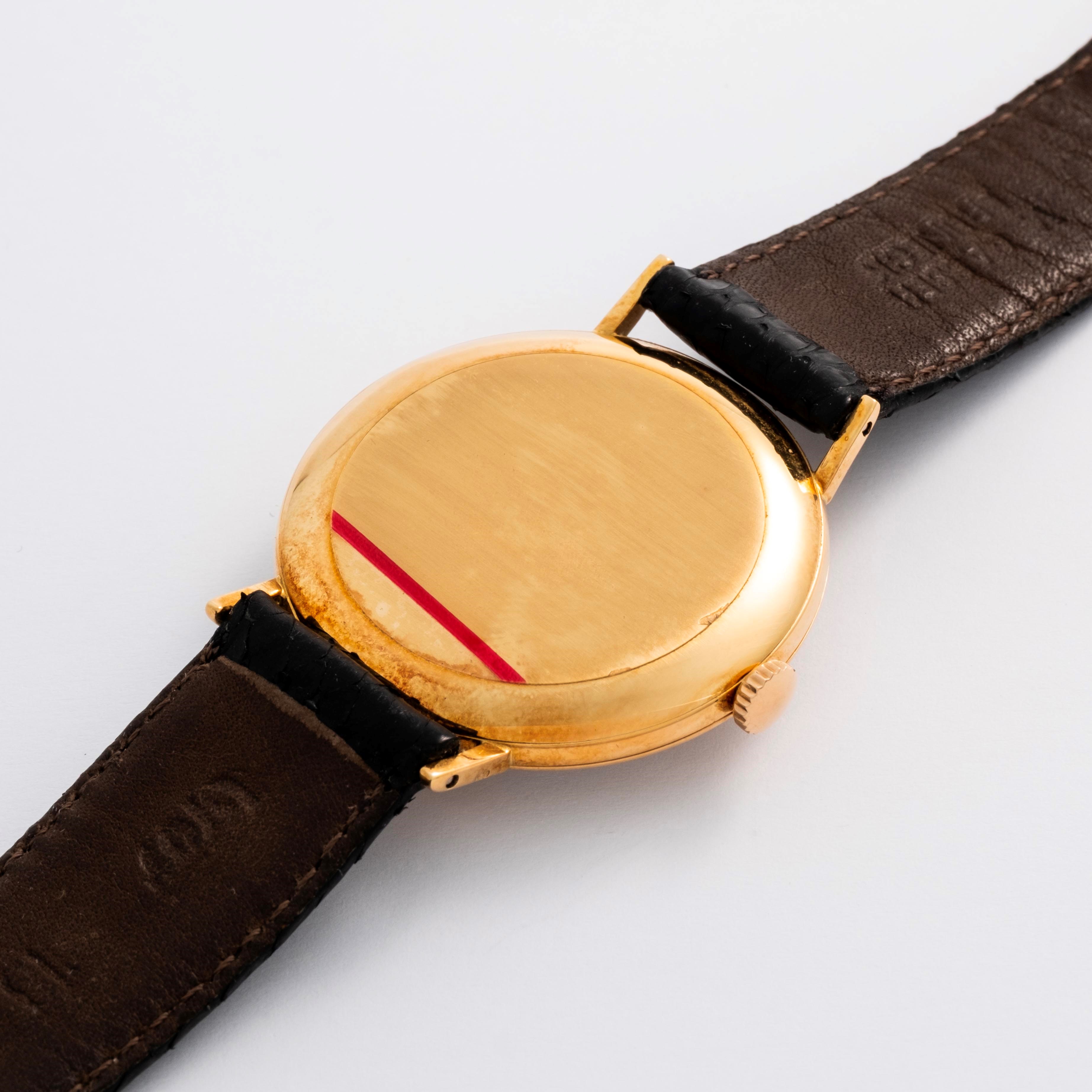 Iwc - Calatrava in oro giallo 18k con quadrante argentè e piccoli secondi (circa 1960)