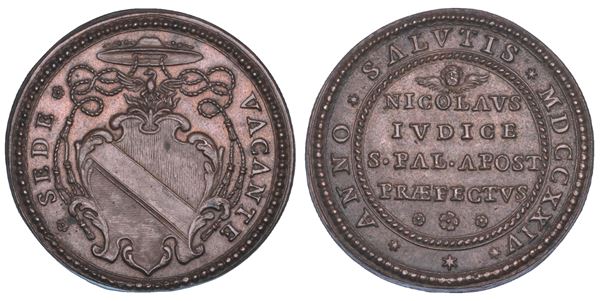 STATO PONTIFICIO. SEDE VACANTE 1724. Medaglia in bronzo emessa dal Prefetto dei Sacri Palazzi Apostolici Monsignore Nicolò del Giudice.