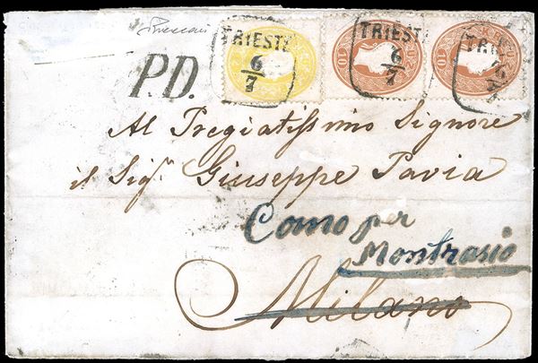 AUSTRIA 1863 - 2 kr. giallo e 10 kr. bruno, due esemplari (Austria 17,20), ottimo stato, su fascetta per stampati di 11 porti da Trieste 6/7/1863 a Milano, rispedita a Moltrasio. Interessante e molto rara. Vaccari.