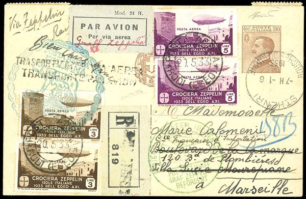 POSTA AEREA 1933 - 3 lire, due esemplari, 5 lire, due esemplari, Zeppelin, con valori complementari (A22,A23,58,61,62), perfetti, su intero postale di Regno 30 cent. Michetti, raccomandato via aerea, da Rodi 20/5/1933 a Marsiglia in Francia, viaggiato tramite il dirigibile Zeppelin, con il bollo speciale della Crociera Italiana. Molto bello e raro. G.Colla, cert. Ferrario.