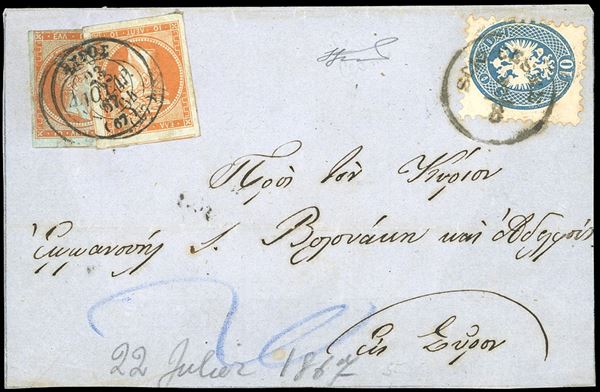 1867 - 10 soldi azzurro, dent. 9 1/2 (44L), perfetto, su lettera da Scio-Cesme 3/8/1867 a Syros, tassata in arrivo con 10 lepta arancio Mercurio, un esemplare su carta bianca e uno su carta azzurra. Pregevole combinazione di valori gemelli. Ferrario.