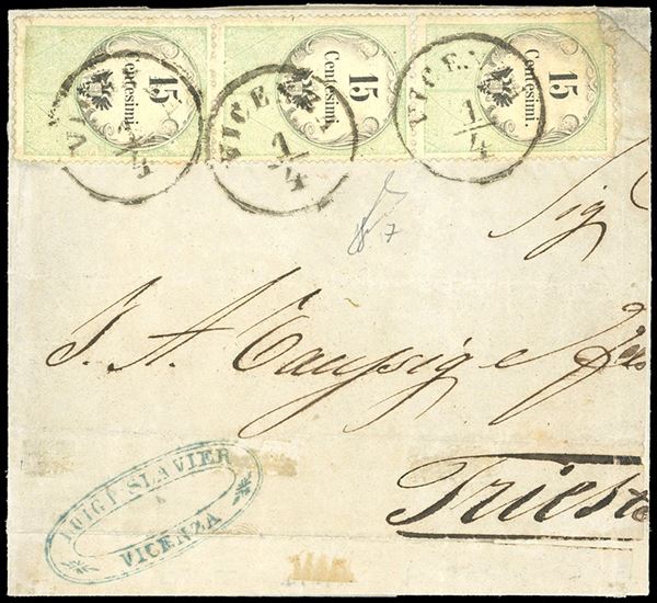 1854 - 15 cent. verde e nero, marca da bollo calcografica (7), eccezionale striscia verticale di tre, un esemplare difettoso, su lettera in parte restaurata, da Vicenza 1/4/1854 a Trieste, bollo d'arrivo. Non si conoscono altre strisce di tre o maggiori, su lettera, di questo fiscale. Rarità. Cert. Ferrario.