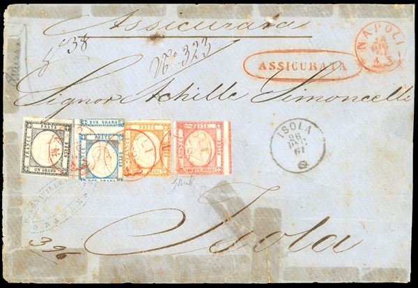 1861 - 1 grano nero, 2 grana azzurro chiaro, 5 grana rosso carminio, 10 grana arancio (19,20,21,22), tagliati irregolarmente, su busta assicurata da Napoli 24/12/1862, annulli in rosso, ad Isola. Rara affrancatura quadricolore. Mezzadri, Chiavarello. Ex coll. Imperato.
