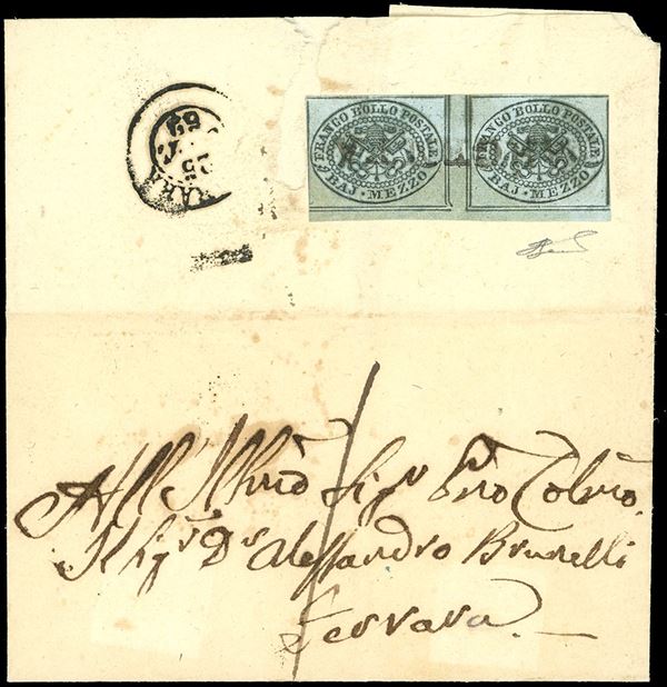 1852 - 1/2 baj grigio azzurro (1a), stampa con inchiostro pseudo-oleoso, coppia orizzontale con interspazio di gruppo al centro, bordo di foglio in basso, perfetta e ben marginata, al verso di lettera in porto assegnato per Ferrara 25/10/1852. Ferrario.