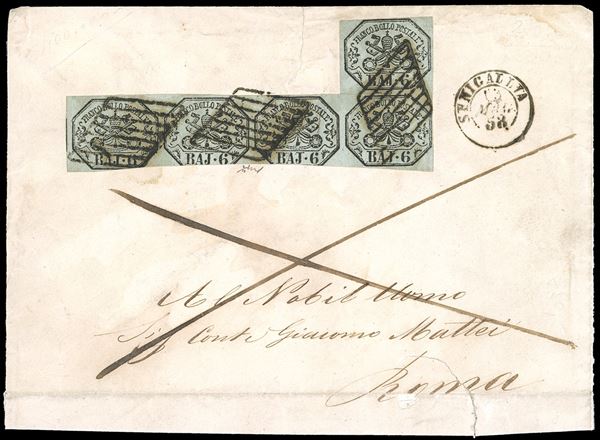 1858 - 6 baj grigio verdastro (7), striscia di cinque a seggiola, difetti di marginatura, su lettera di sei porti da Senigallia 13/5/1858 a Roma. Rara, occasione. Chiavarello. Ex coll. Imperato.
