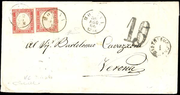 1860 - 40 cent. rosso (16C), coppia orizzontale con forte disallineamento, a filo a sinistra, su lettera da Modena 30/8/1860 a Verona. La lettera pesava tra i 30 e 35 grammi, che corrispondevano a 4 porti per la Sardegna e a 2 porti per la distanza austriaca, fu tassata con bolli a tampone inizialmente 5 soldi, poi corretti in 10. Interessante e molto rara, per specialista. Cardillo, Ferrario. Ex coll. Hess.