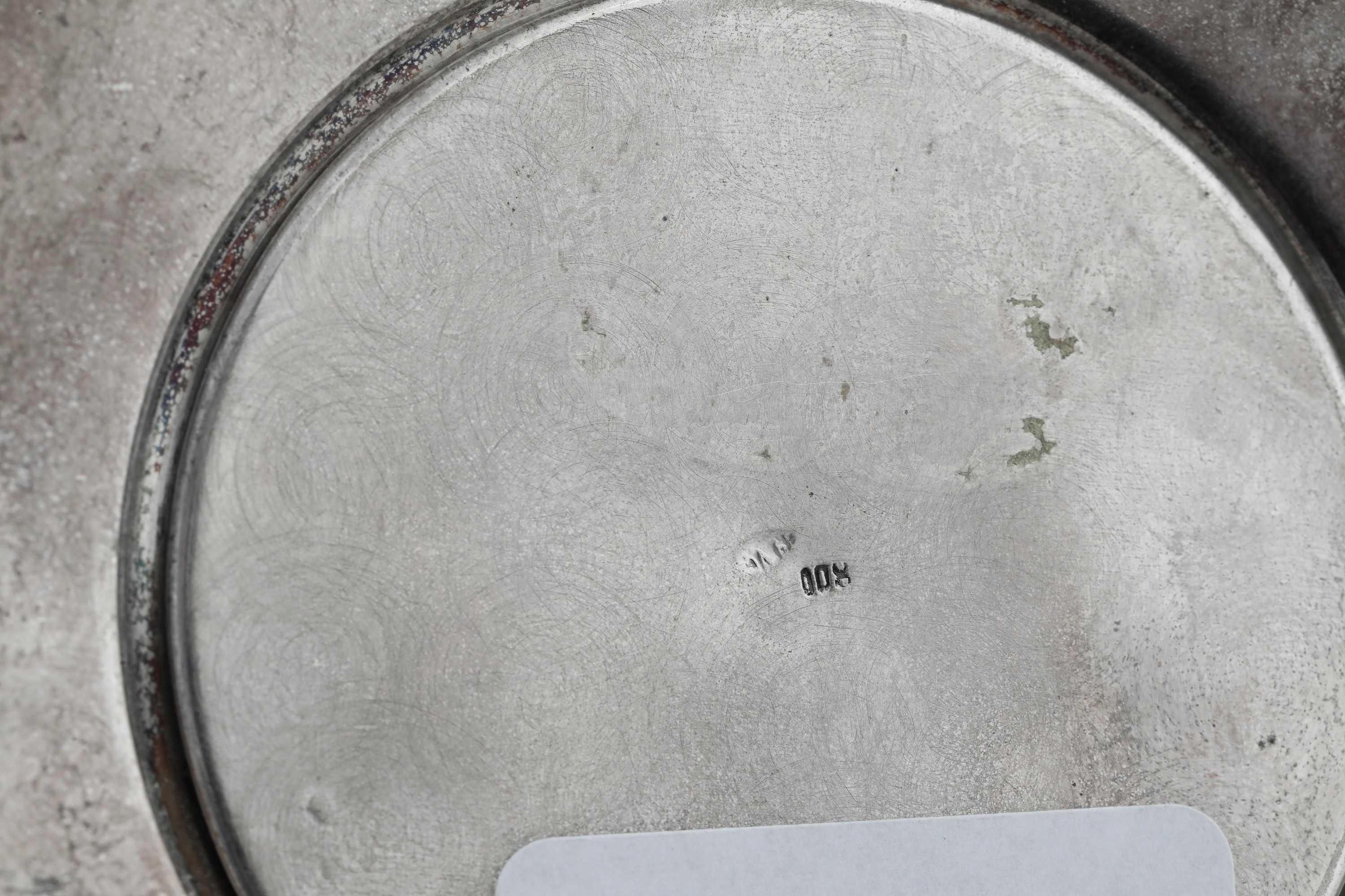Coppia di candelabri, argento fuso e sagomato, prima metà del XX secolo
