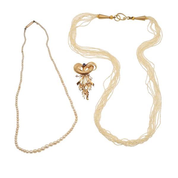 Two pearl necklaces and one diamond and synthetic sapphire brooch
