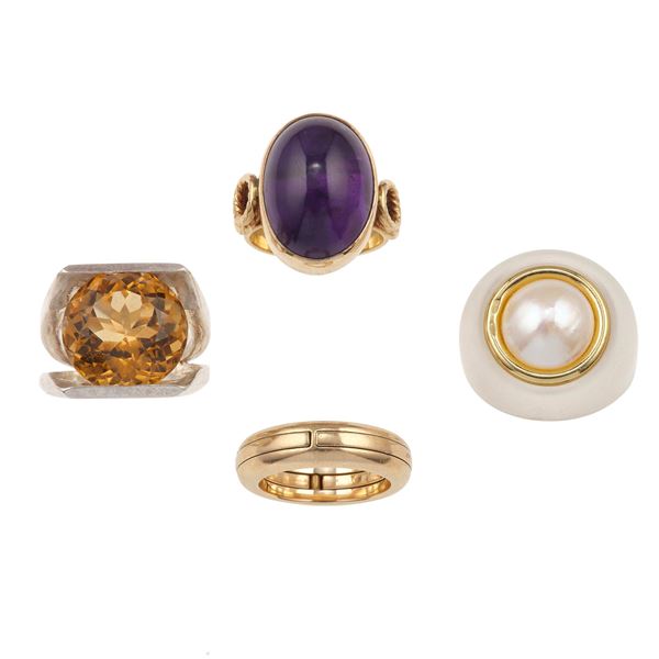 Group of four gem-set low-karat gold and silver rings