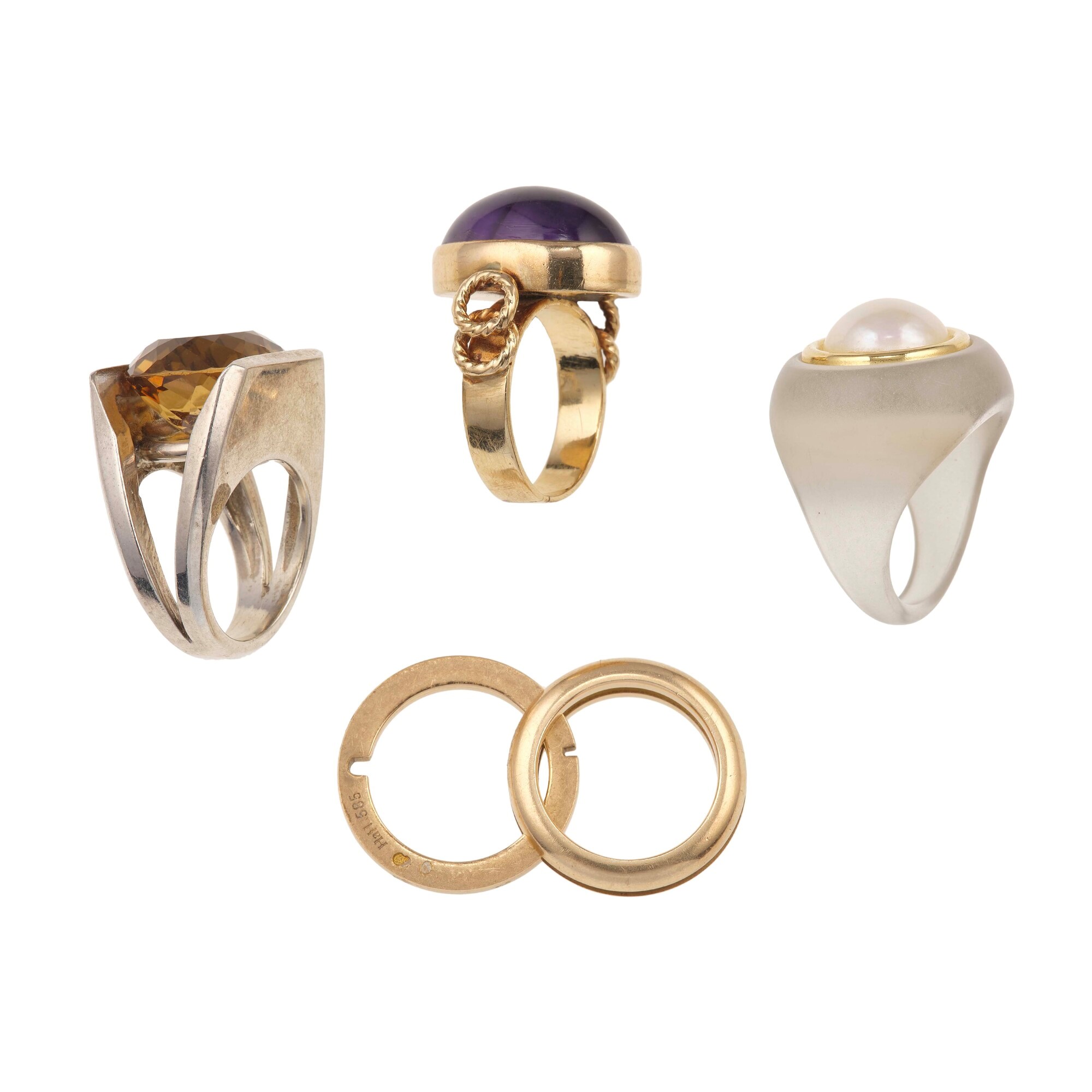 Lotto composto da quattro anelli con perla mabè, ametista e quarzo citrino