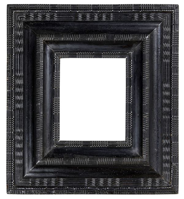 Cornice guillochè. XVII secolo