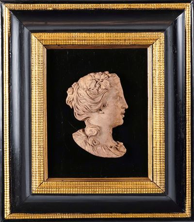 Ambito di Giovanni Merchiori, Profilo di Flora, terracotta modellata entro cornice in legno intag...