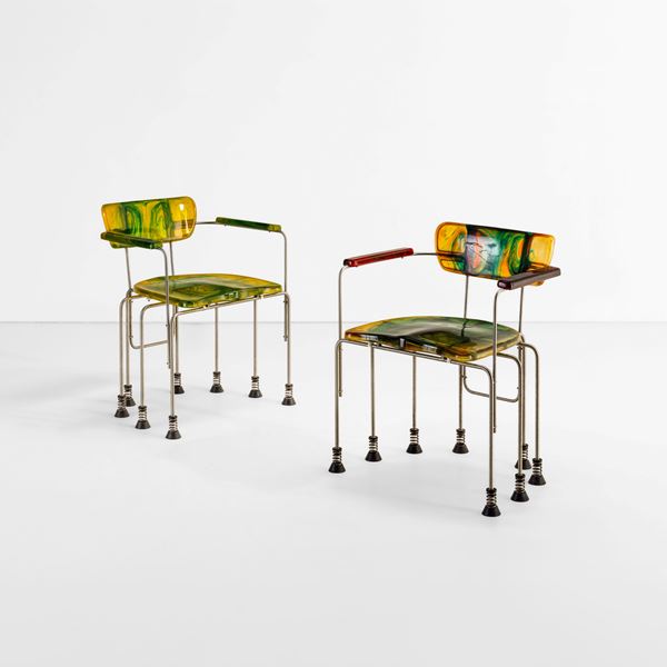 Due poltrone mod. 544 Broadway