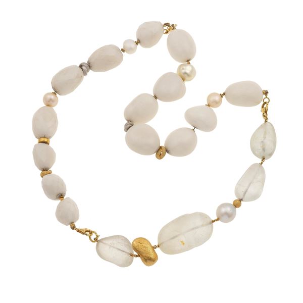 Three chalcedony, quartz, pearl, wax gold and gold bracelets