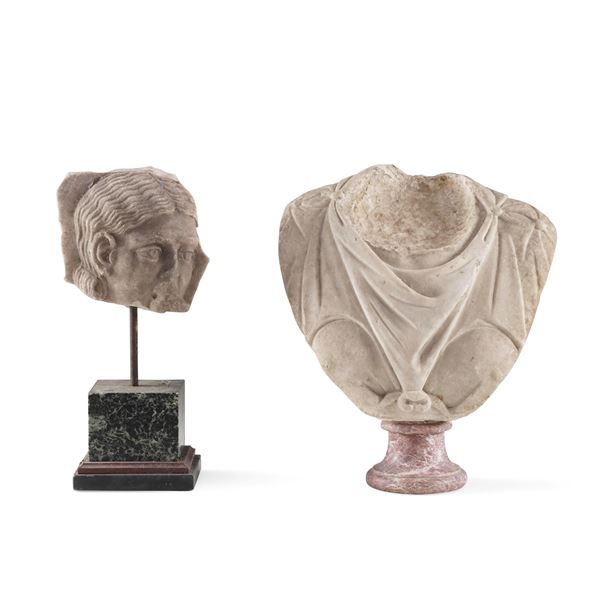 Un busto acefalo e un frammento con volto in marmo