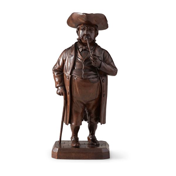 Figura maschile in legno con pipa