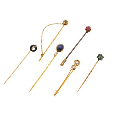 Set di sei spilloni in oro giallo 750 con gemme