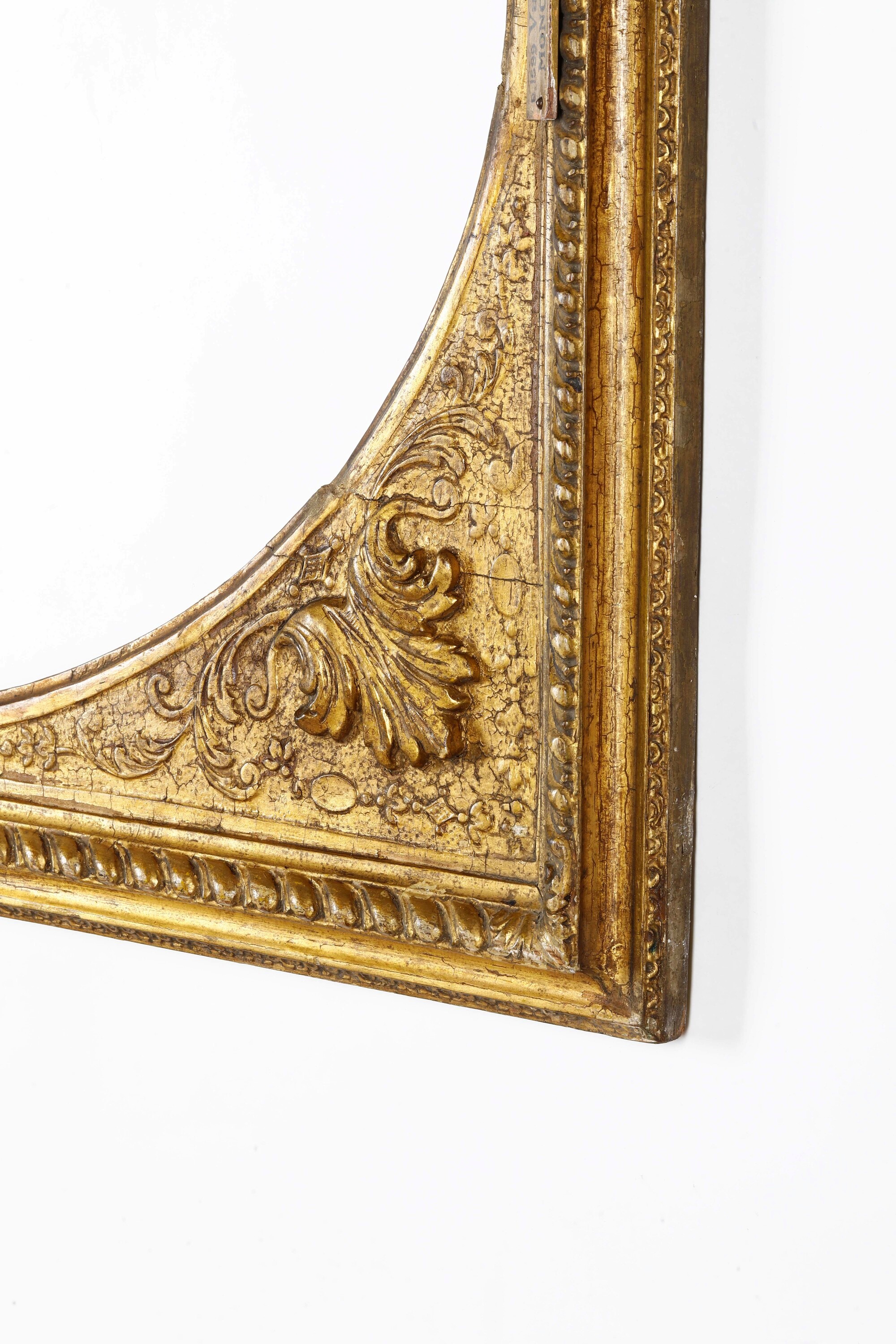 Cornice a luce ovale in legno dorato, XIX secolo
