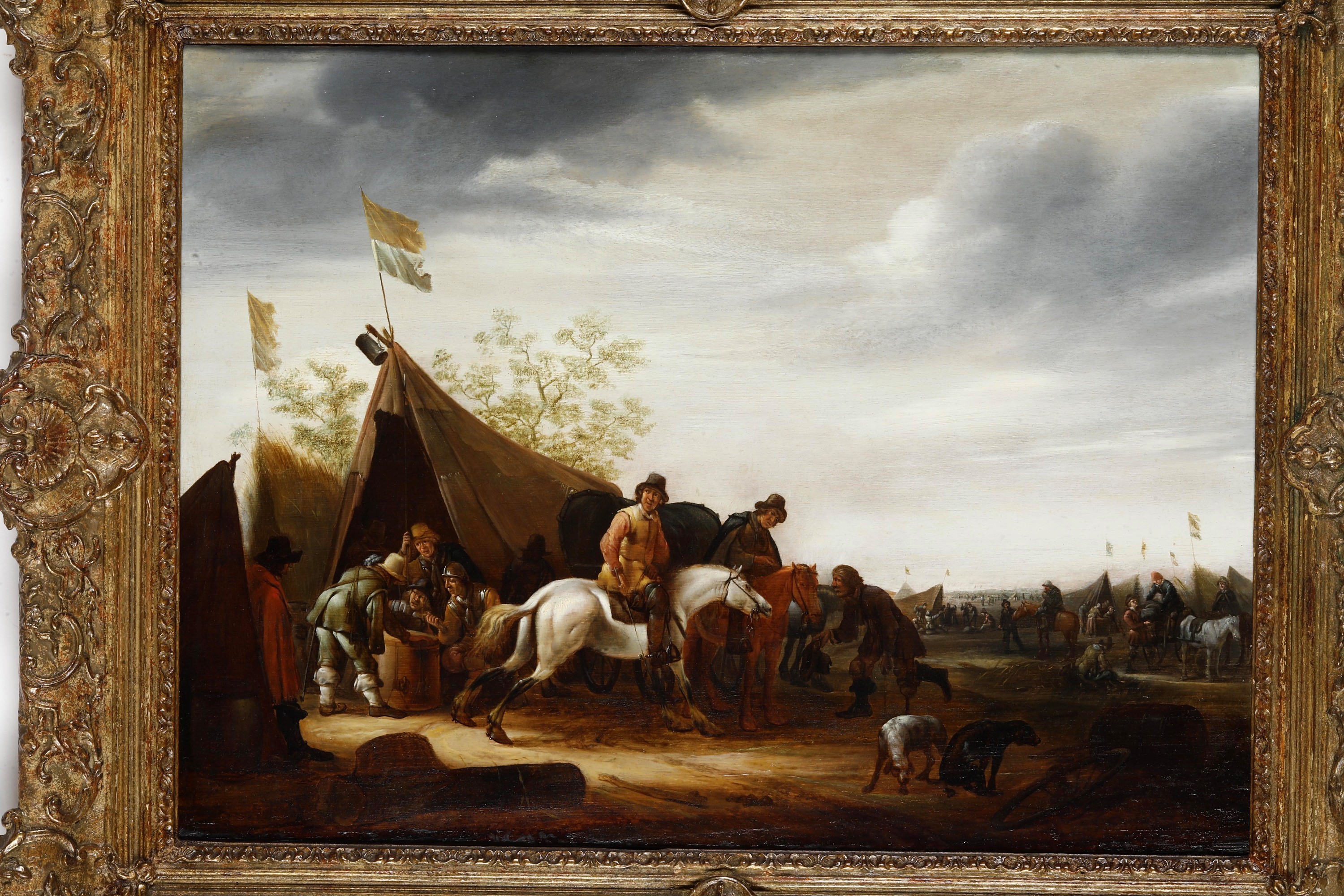 Cavalieri in sosta presso un accampamento militare