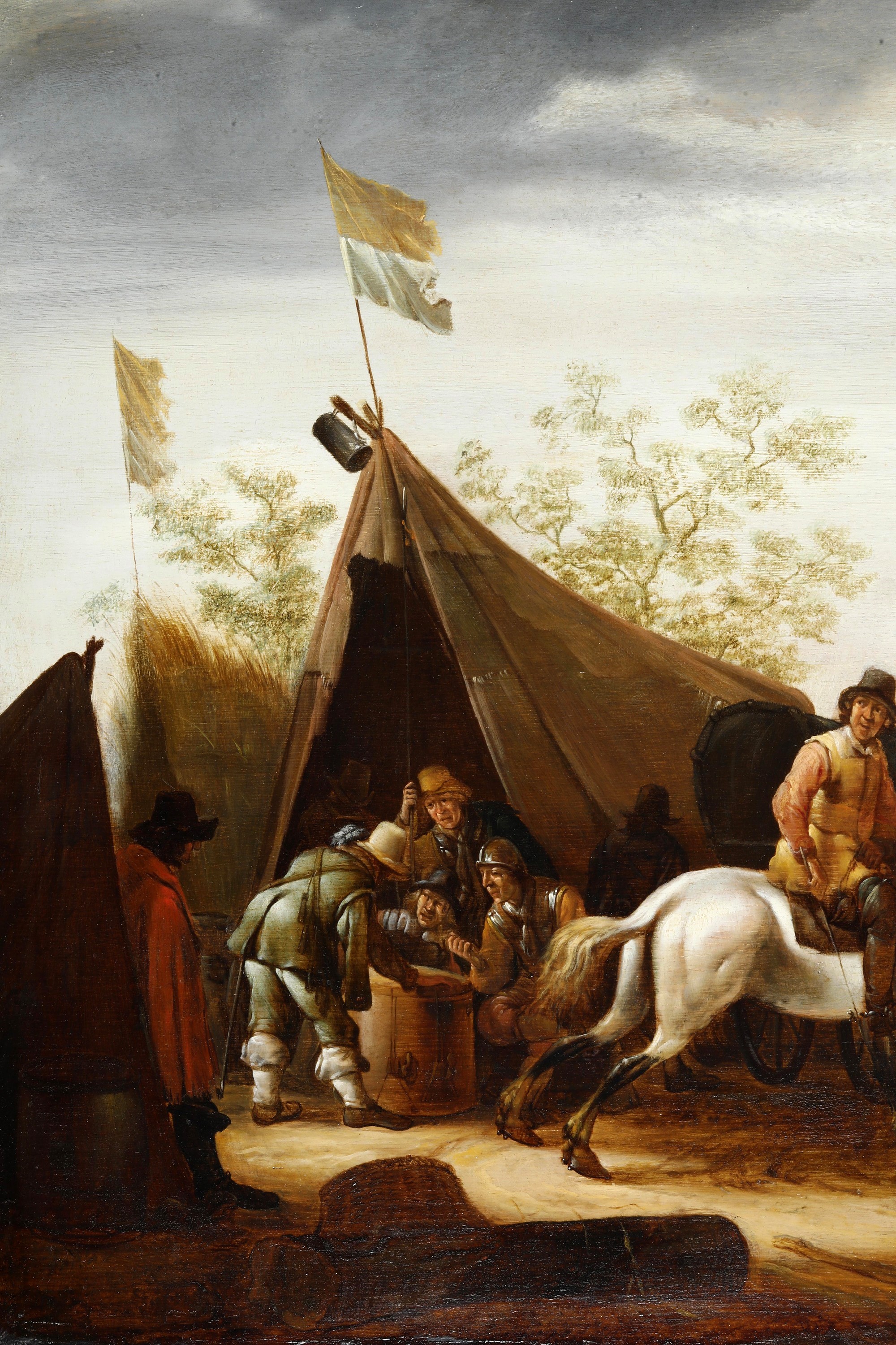 Cavalieri in sosta presso un accampamento militare