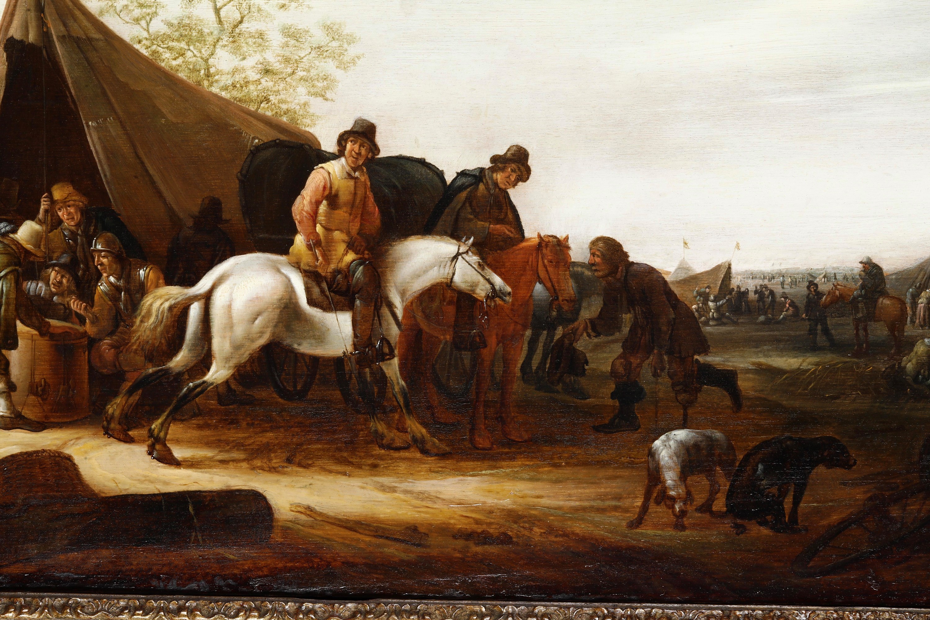 Cavalieri in sosta presso un accampamento militare