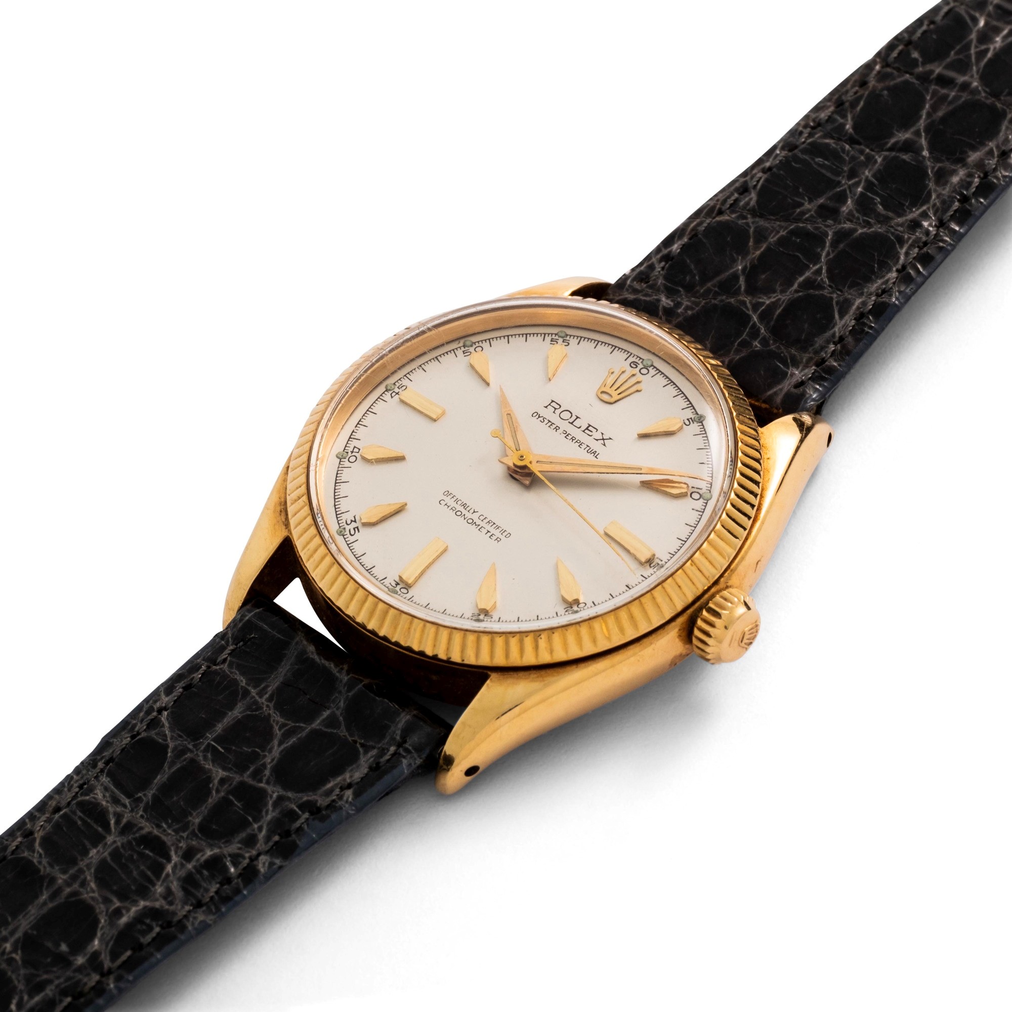 Rolex - Oyster Perpetual ref. 6567 in oro giallo 18k, quadrante argentè con indici a deltoide, ca...