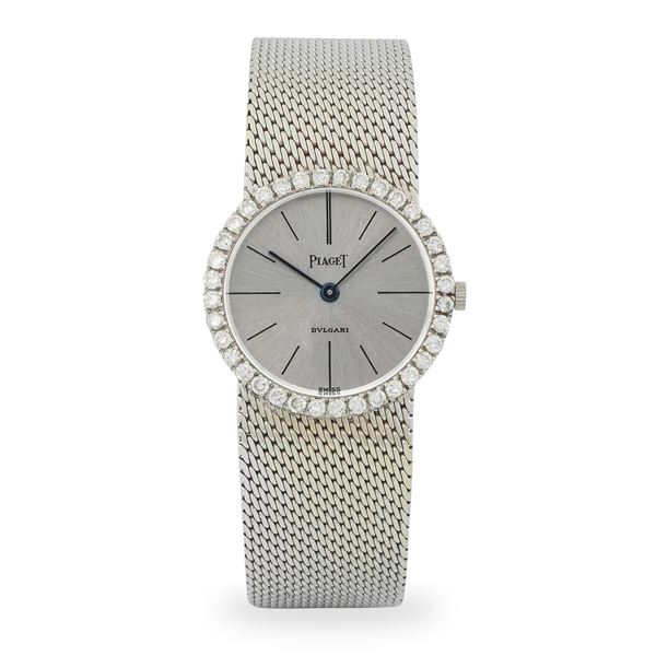 Piaget - Lady Diamonds "Bulgari" in oro bianco 18k e diamanti con bracciale integrato maglia milanese, quadrante argentè Soleil, circa 1970