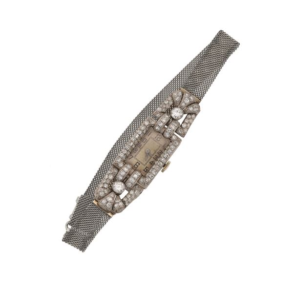 Diamond and gold lady's wristwatch. Minor defects. The movement has not been tested for the accuracy of time and may need a service