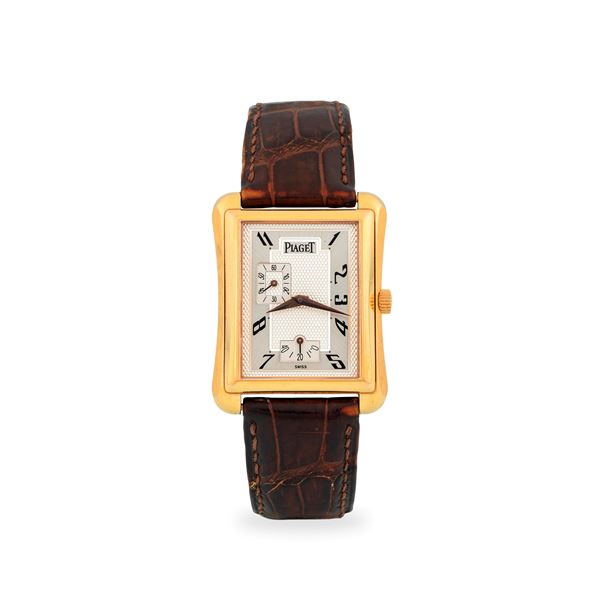 Emperador in oro rosa 18k, quadrante di forma argenté con inserti Clous de Paris, piccoli secondi e riserva di carica, circa 1990