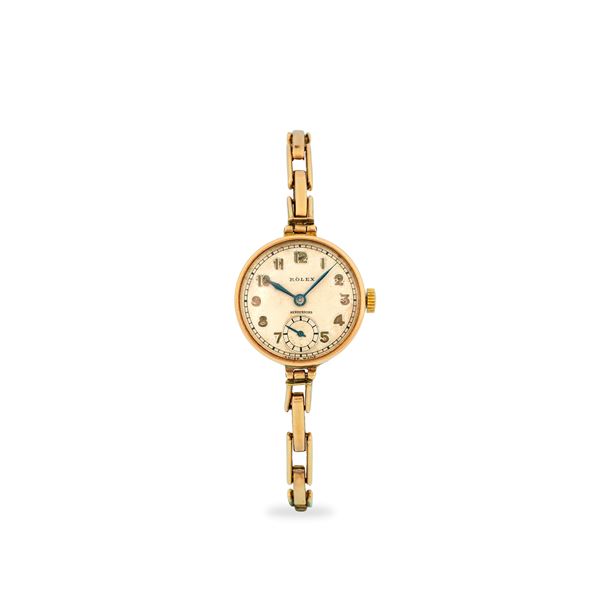 Solo tempo in oro rosa 9k, quadrante argentè firmato 