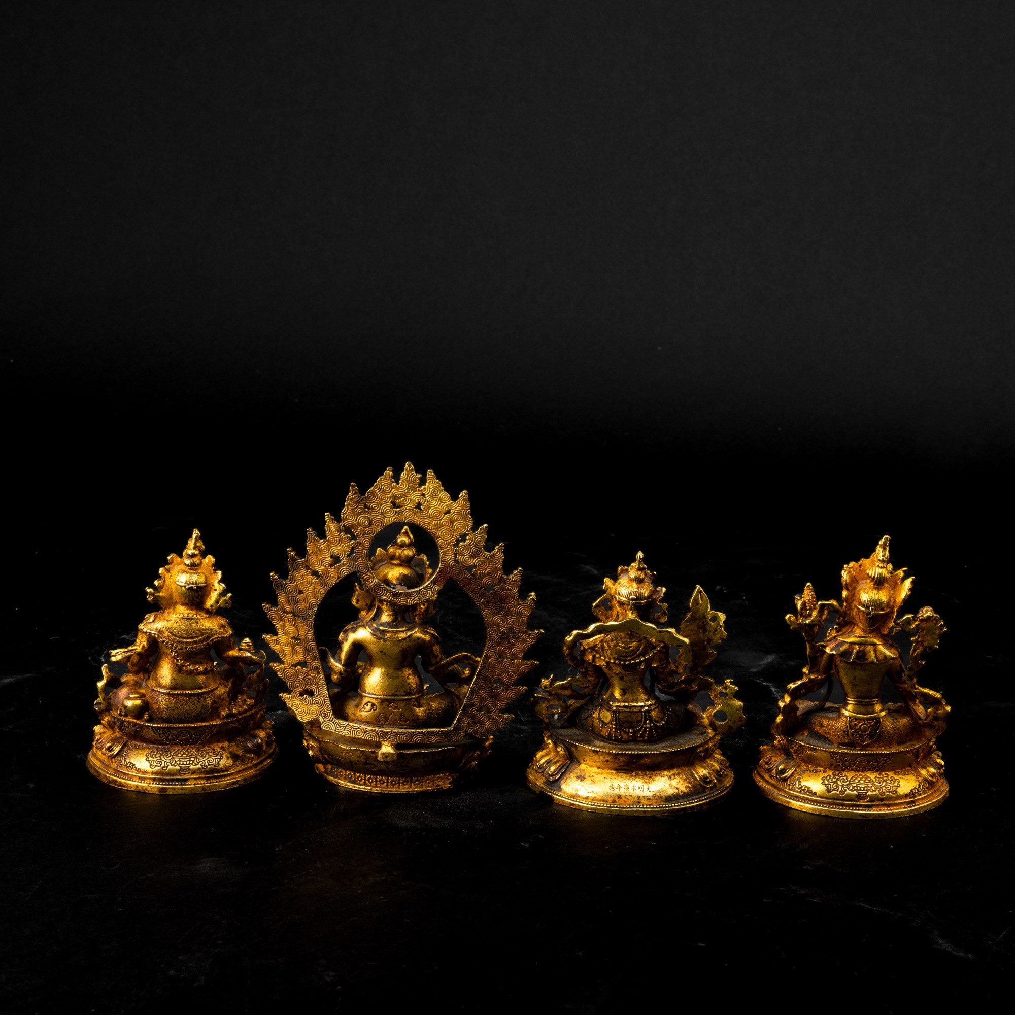 Tibet, Quattro figure in bronzo raffiguranti divinità, XIX secolo