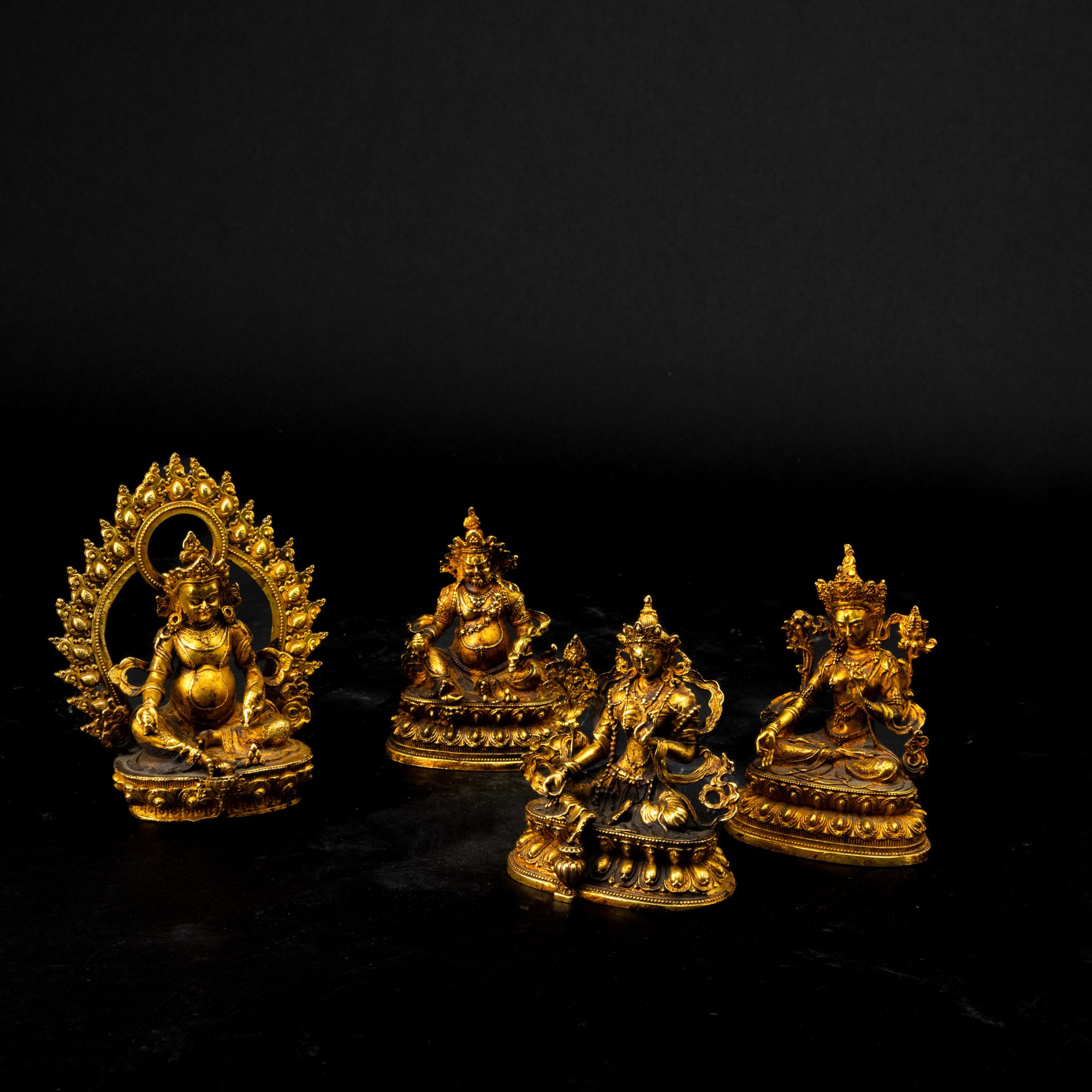 Tibet, Quattro figure in bronzo raffiguranti divinità, XIX secolo