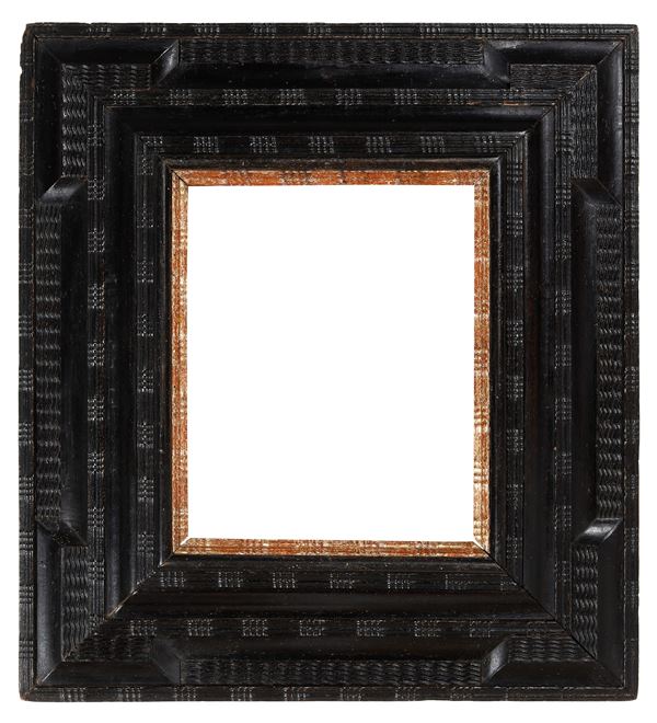 Cornice guillochè. XVII secolo