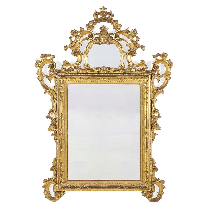 Specchiera in legno intagliato e dorato. XIX secolo  - Auction Italian Mansions - Cambi Casa d'Aste