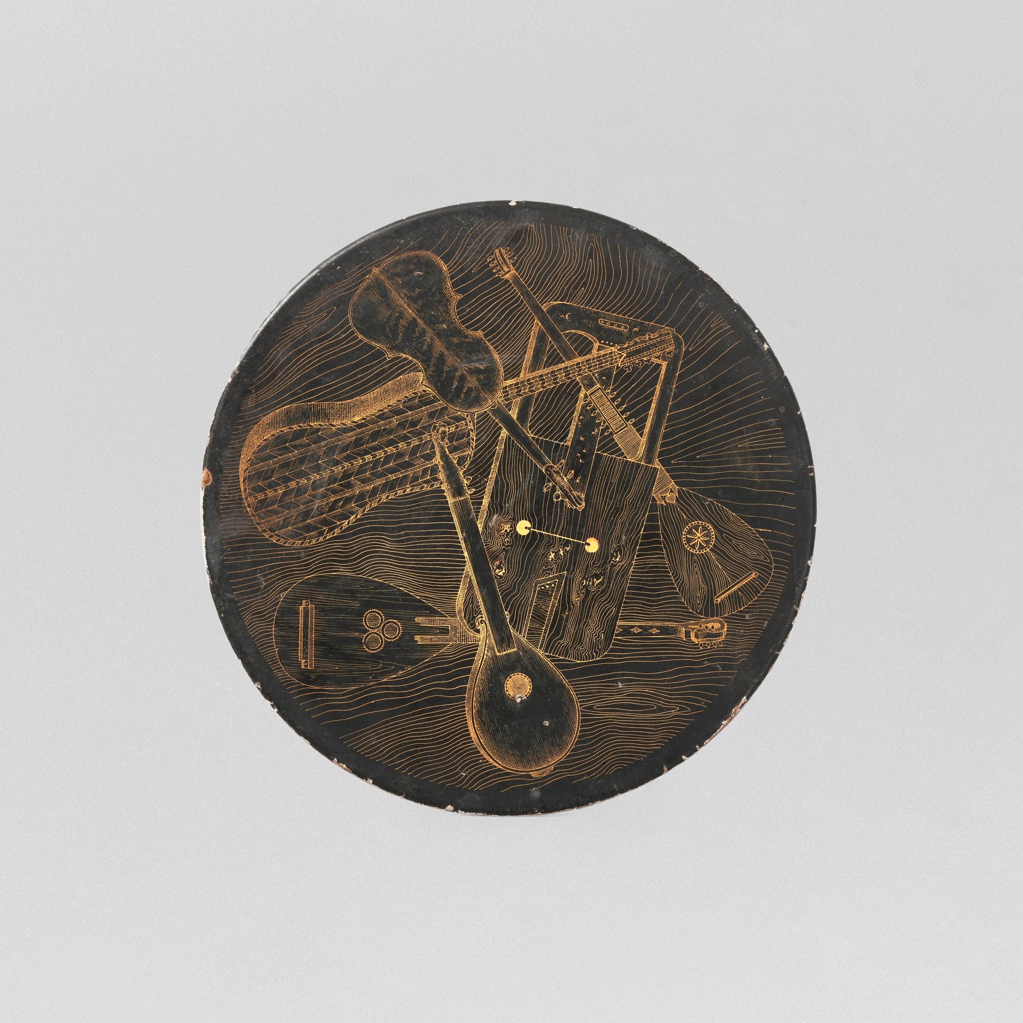 Piero Fornasetti - Tavolo occasionale mod. “Strumenti musicali”