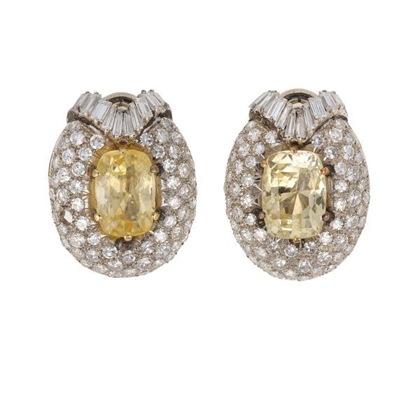 Pair of corundum, diamond and platinum earrings. One missing diamond