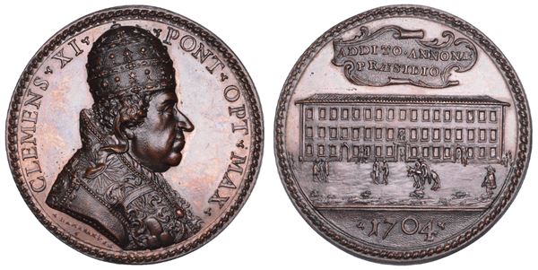 STATO PONTIFICIO. CLEMENTE XI (Giovanni Francesco Albani), 1700-1721. Medaglia in bronzo 1704 (A. IV). Il palazzo dell'Annona a Roma.