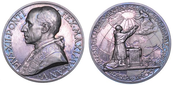 CITTA' DEL VATICANO. Pio XII, 1939-1958. Medaglia annuale in argento 1942 A. V. Consacrazione dei popoli dilaniati dalla guerra.