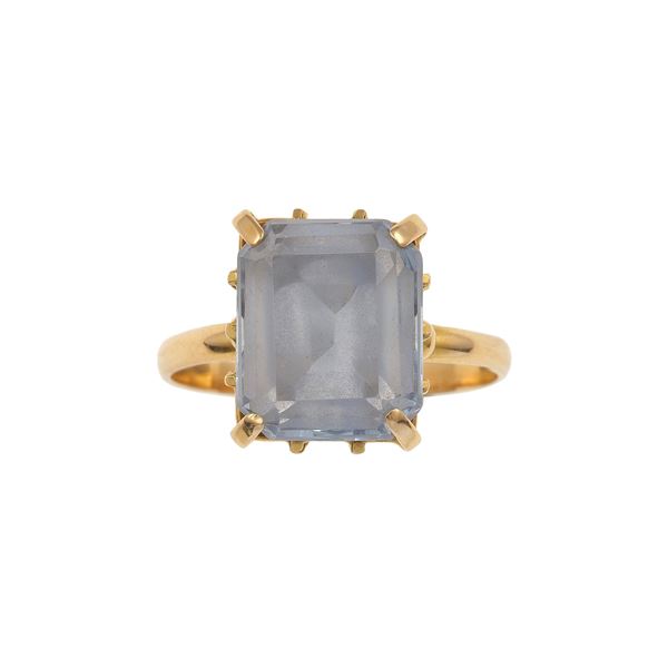Blue topaz and gold ring