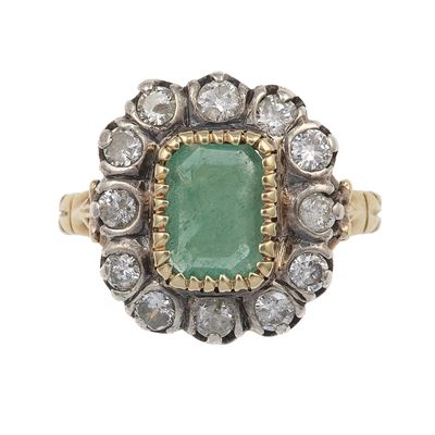 Anello con smeraldo e diamanti, montatura in oro giallo 750/1000 e argento