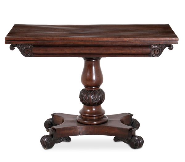 Tavolo in mogano intagliato con piano a libri, Inghilterra XIX secolo