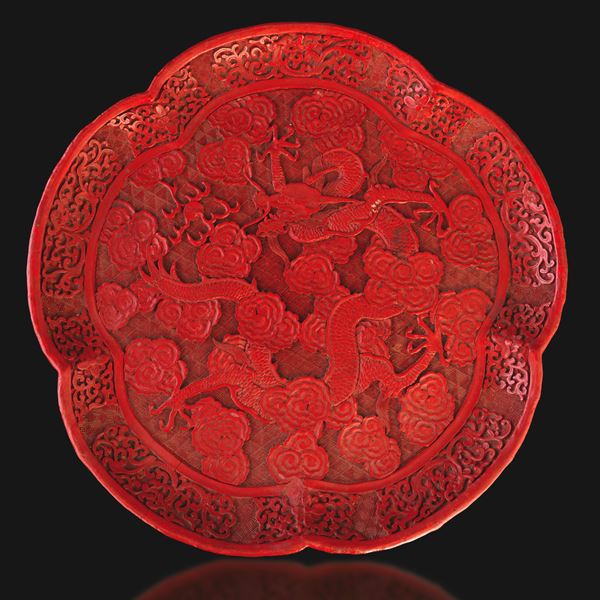 Red lacquer tray carved with a dragon among clouds, China, Qing Dynasty, Guangxu period (1875–1907).