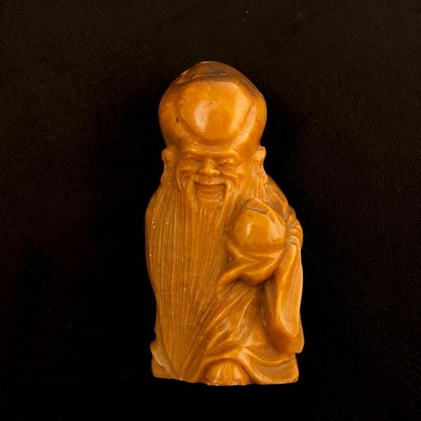 Figura in pietra saponaria raffigurante Shou Lao, Cina, Dinastia Qing, XIX secolo