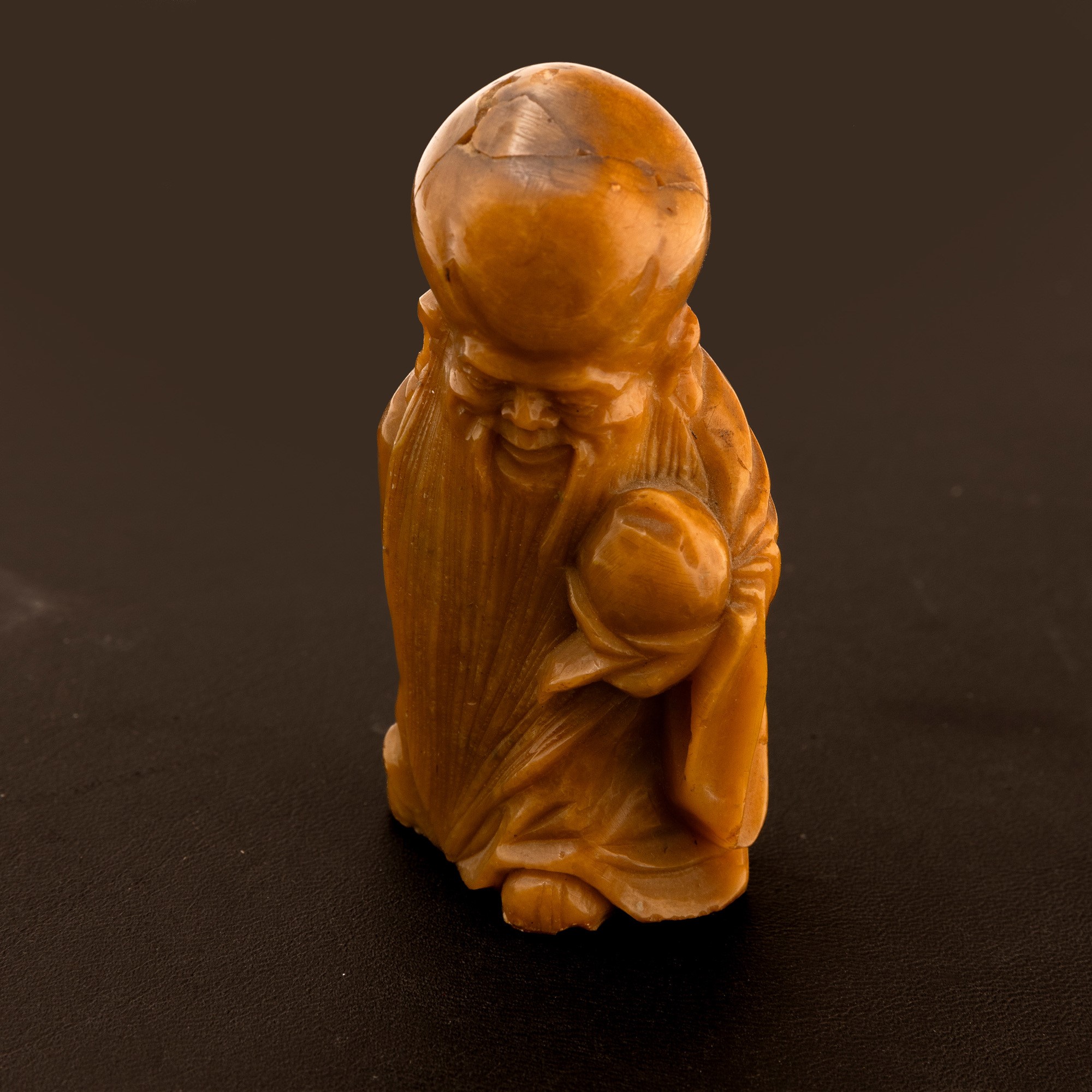 Figura in pietra saponaria raffigurante Shou Lao, Cina, Dinastia Qing, XIX secolo