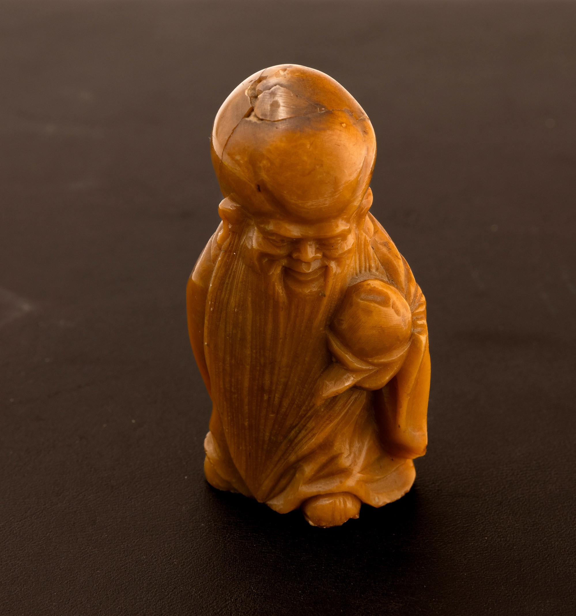 Figura in pietra saponaria raffigurante Shou Lao, Cina, Dinastia Qing, XIX secolo
